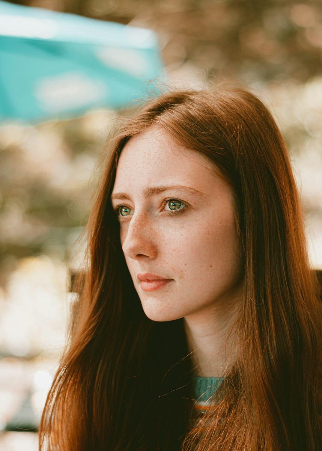 Portrait of a young white woman with auburn hair